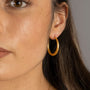 model wears Brushed Large Tapered Hoop Earrings (30mm)
