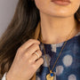 model wears White Enamel Gold Ring
