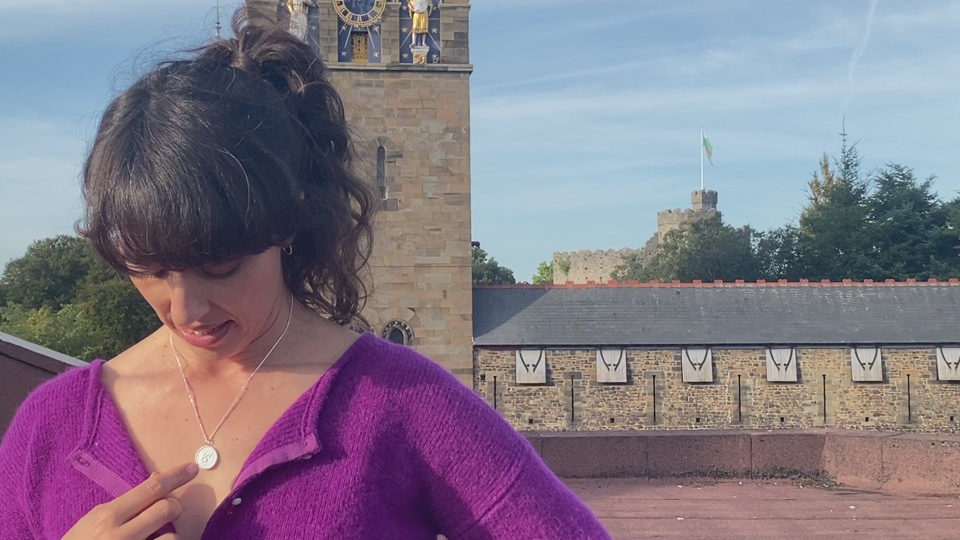 Lisa Jen, wears the shorthand Brave necklace on the roof of the studio opposite Cardiff Castle