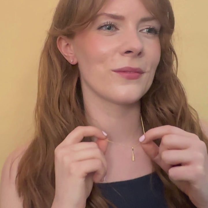 model wears 18k Gold Vermeil Comet Charm Pendant on rolo gold vermeil chain  - Claire Hill Designs