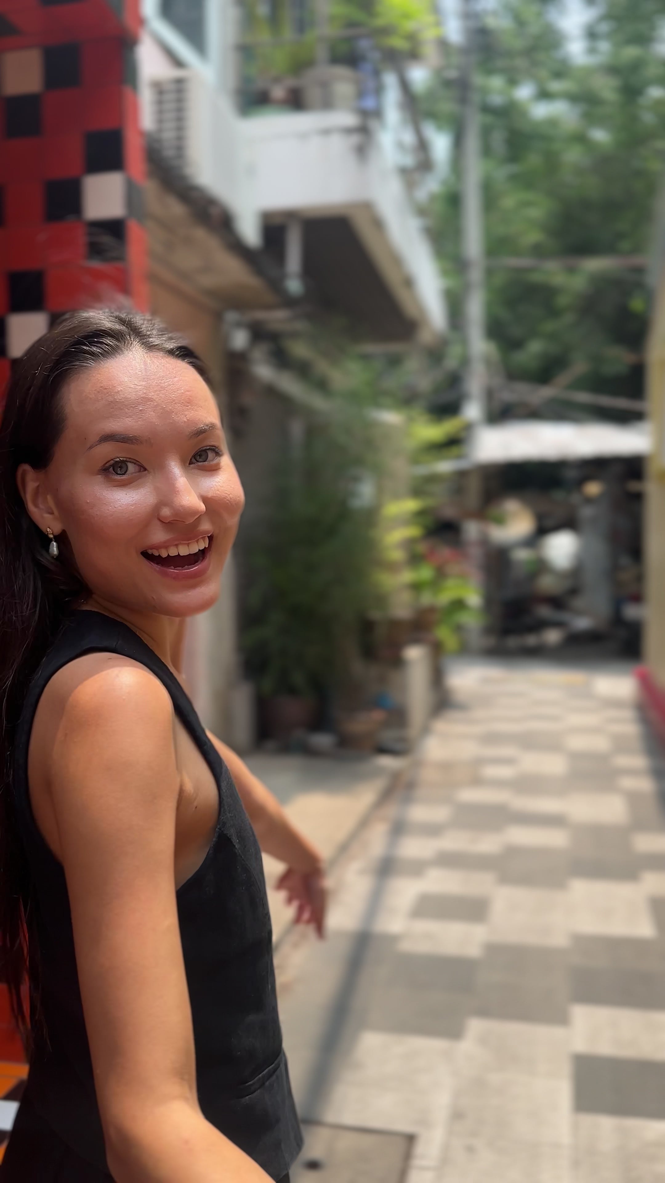 April walks through the streets of Talt Noi, Bangkok wearing Claire Hill Designs jewellery