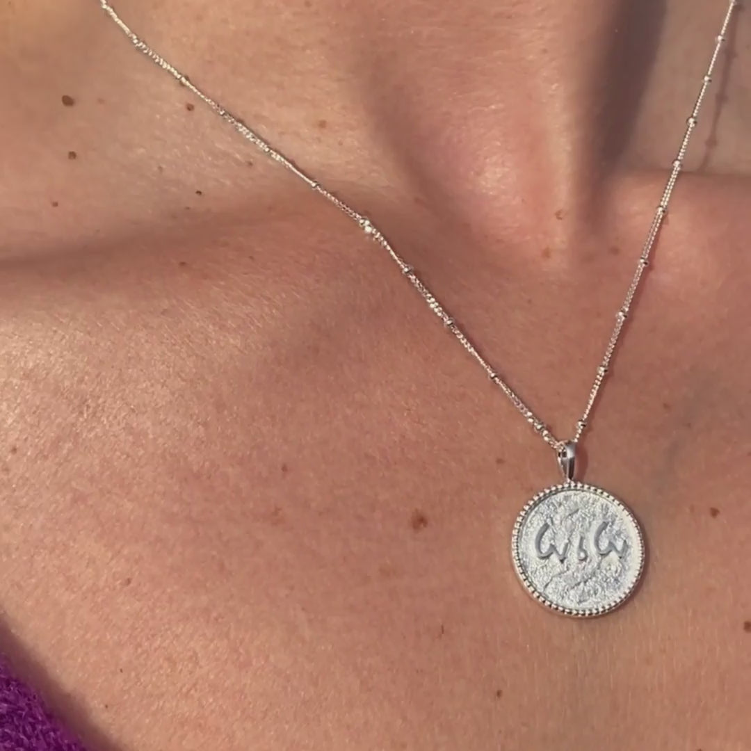 "Love is Love" Shorthand Silver Coin Necklace