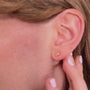 model wears 14k Gold Vermeil Shorthand Stud Earring meaning Loved - Claire Hill Designs
