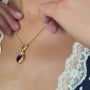 model wears 18k Gold Vermeil Hand In Heart Charm Pendant necklace- Claire Hill Designs