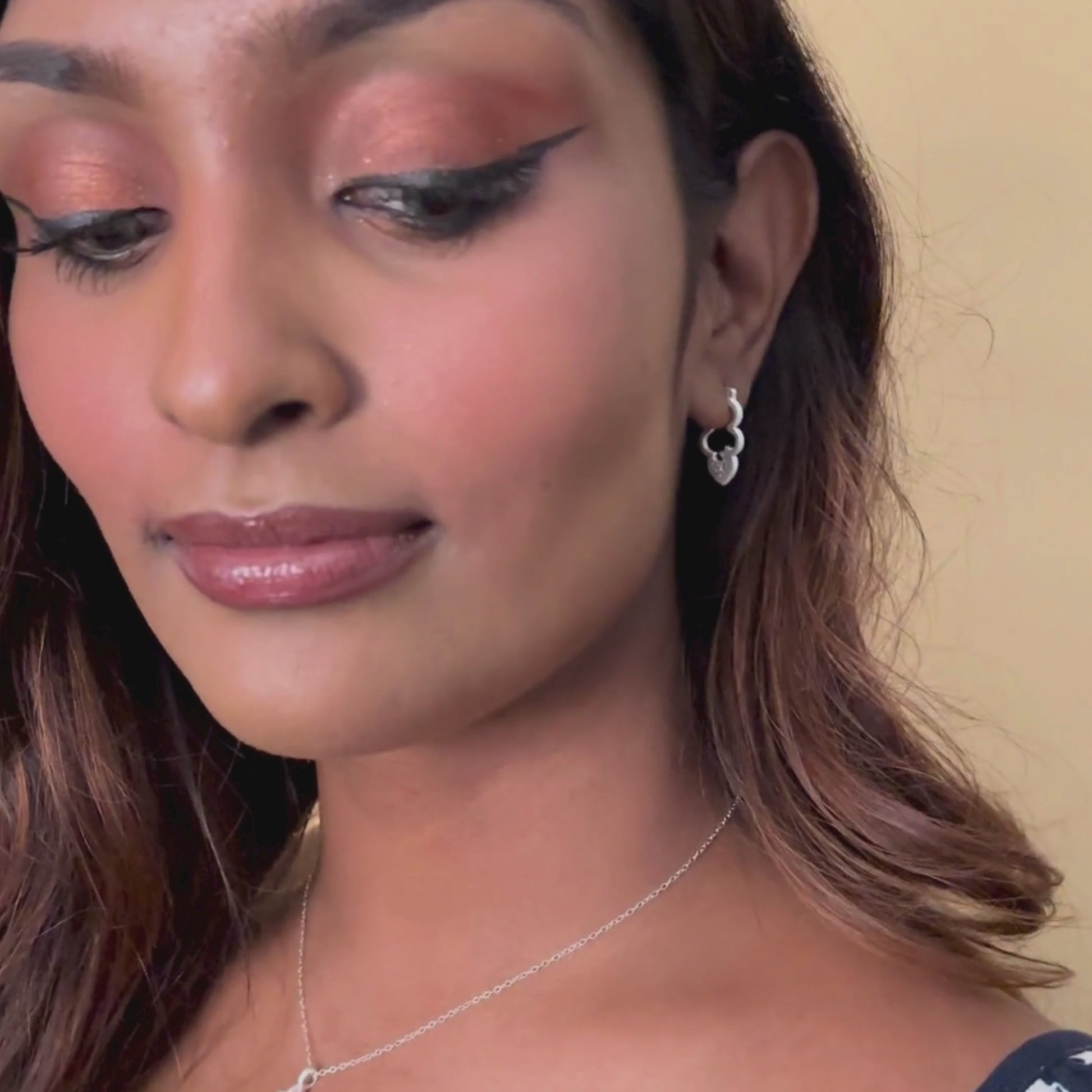 model wears Silver Sparkly Cloud Hoop Earrings  - Claire Hill Designs