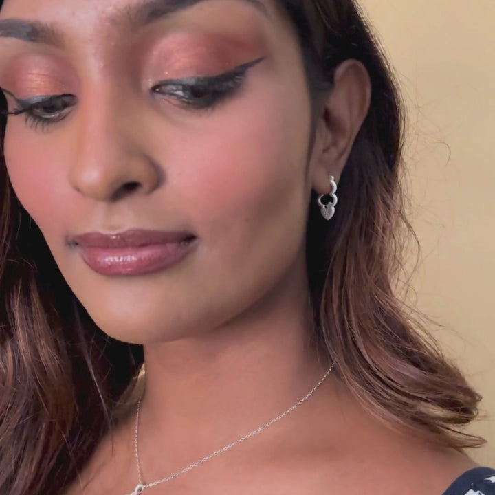 model wears Silver Sparkly Cloud Hoop Earrings  - Claire Hill Designs