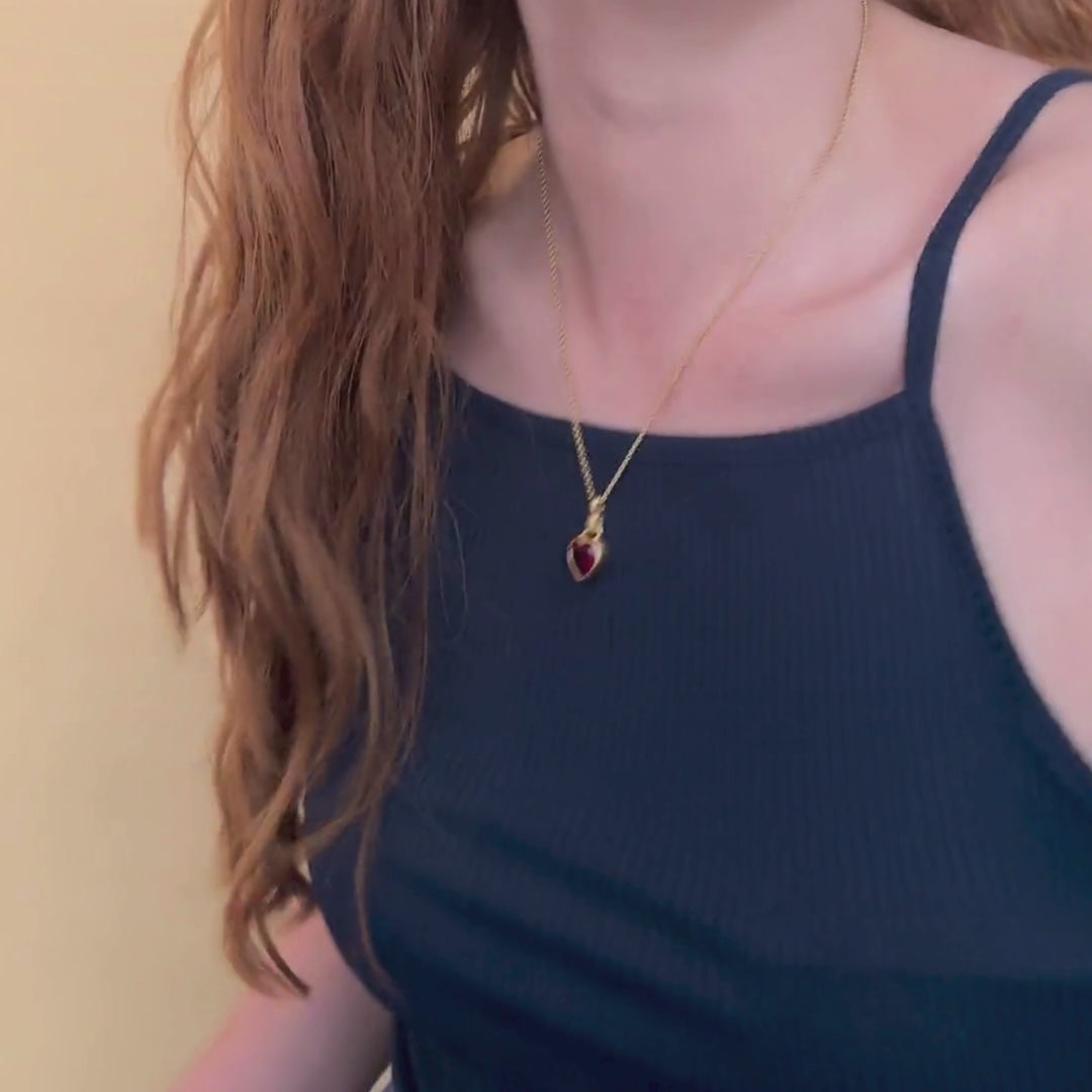model wears 18k Gold Vermeil Hand In Heart Charm Pendant necklace- Claire Hill Designs