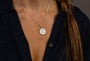 close up of women wearing C*** Silver Shorthand Coin Necklace