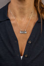 model wears Difficult Woman Silver Bar Necklace