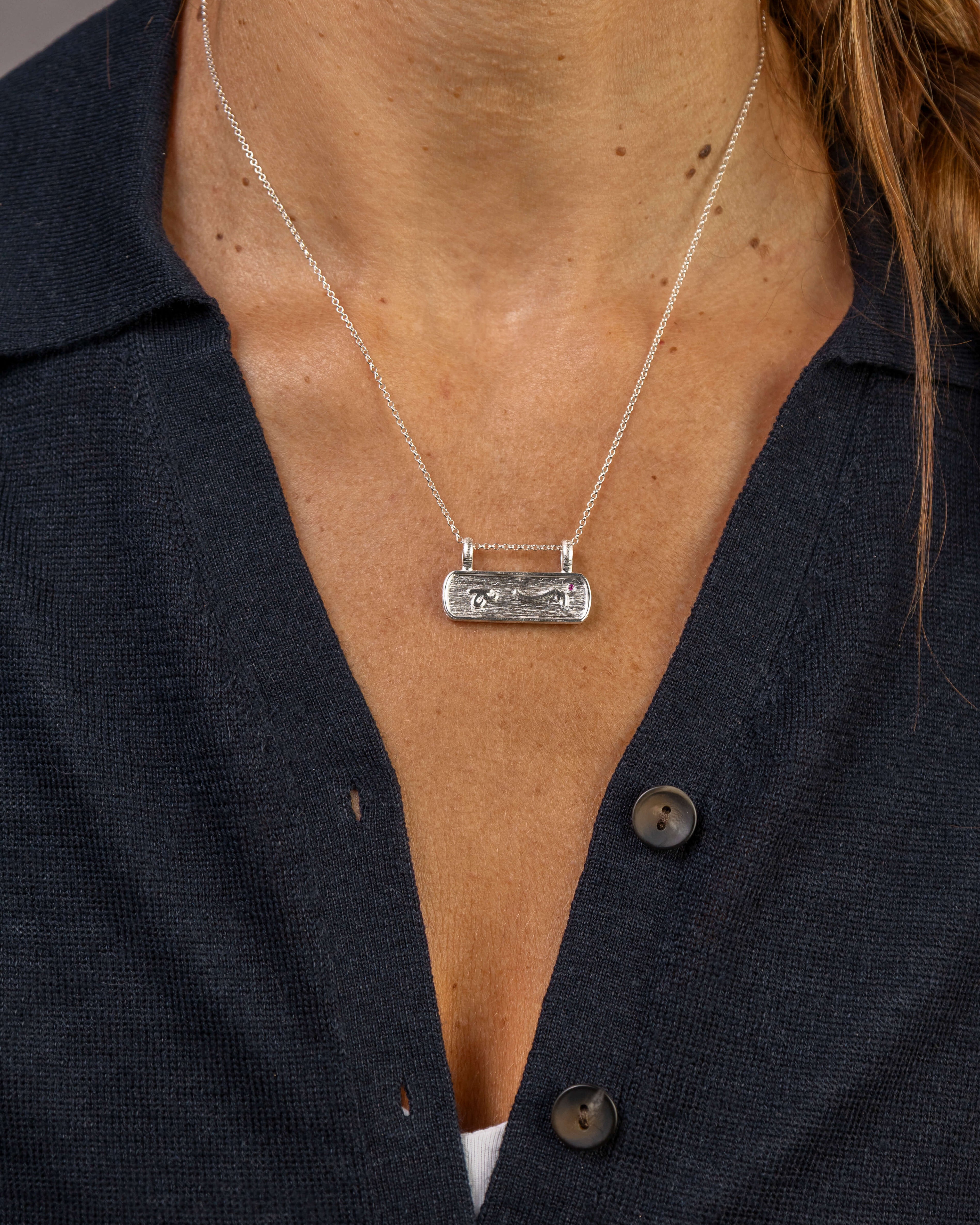 model wears Difficult Woman Silver Bar Necklace