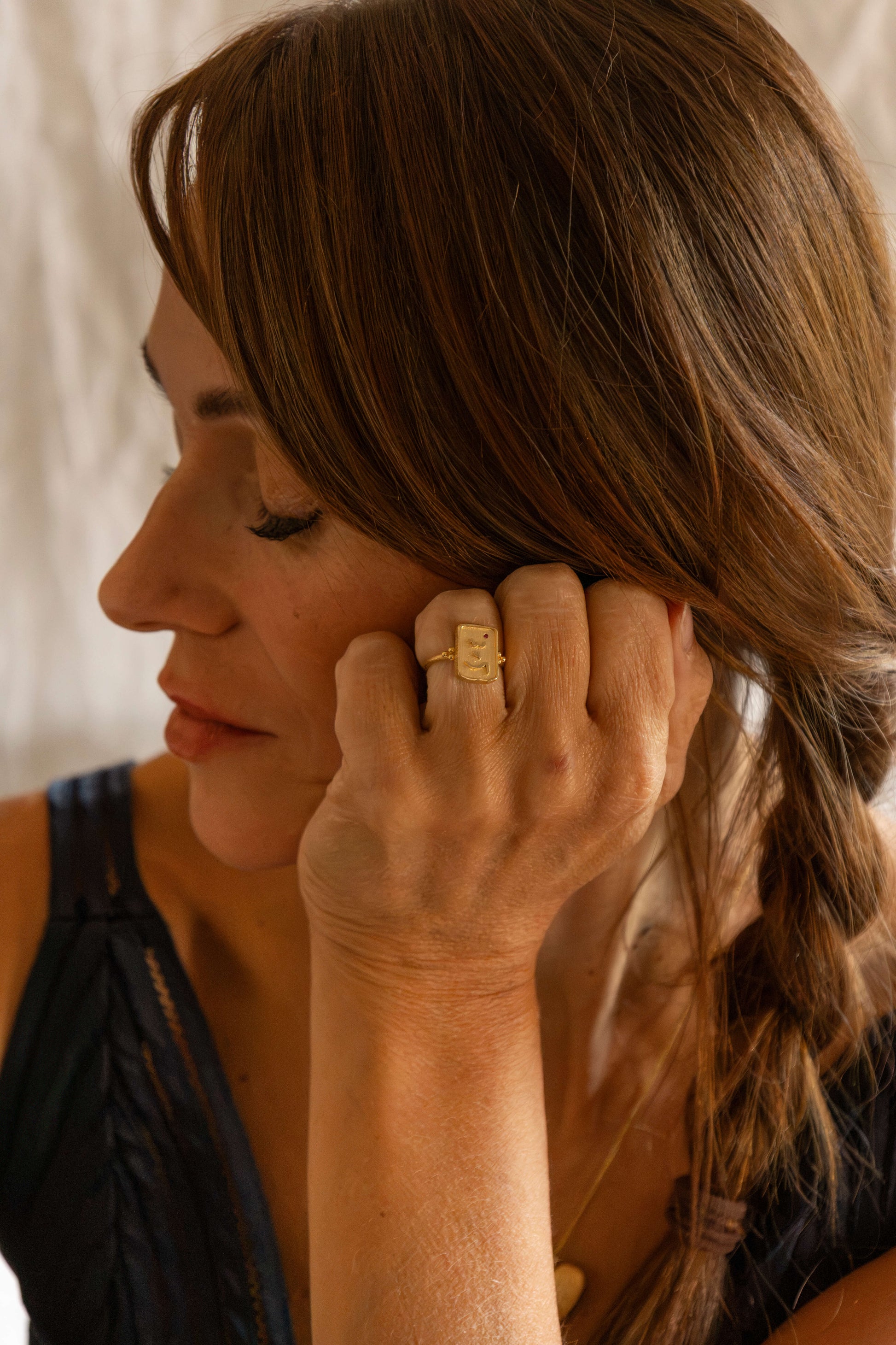model wears Know Your Worth Gold Ring with ruby gemstone