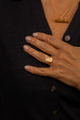 model wears Know Your Worth Gold Ring with ruby gemstone