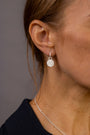 model wears F*** this Sh*t Silver Huggie Hoops