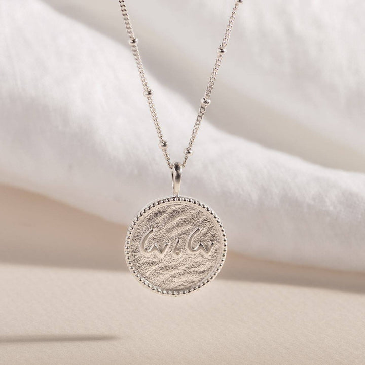 "Love is Love" Shorthand Silver Coin Necklace