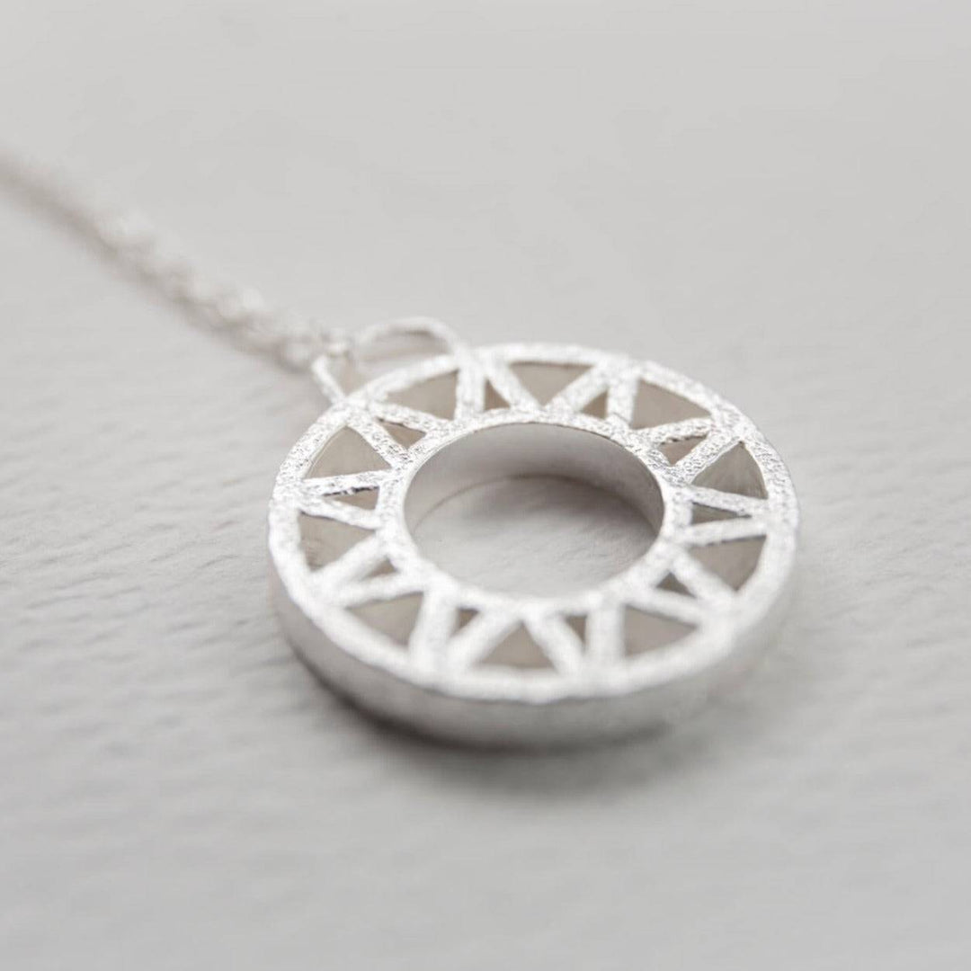 Geometric Silver Disc Pendant Necklace - close up