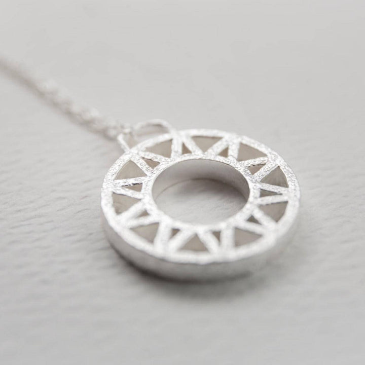 Geometric Silver Disc Pendant Necklace - close up