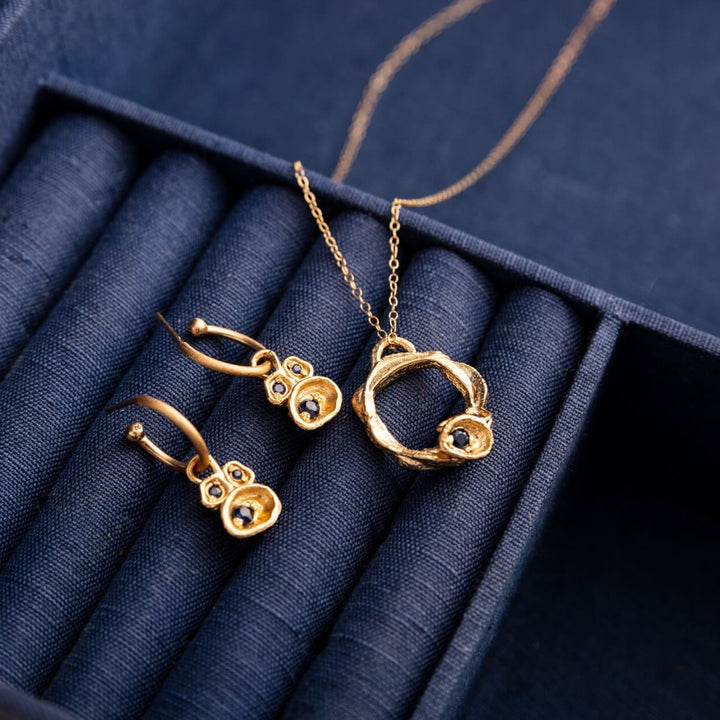sapphire gold vermeil birthstone hoop earrings and sapphire gold vermeil large birthstone eternity necklace