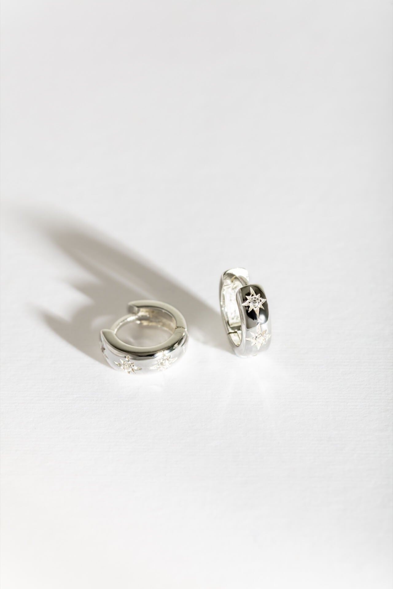 Silver Sparkly Star Huggie Earrings