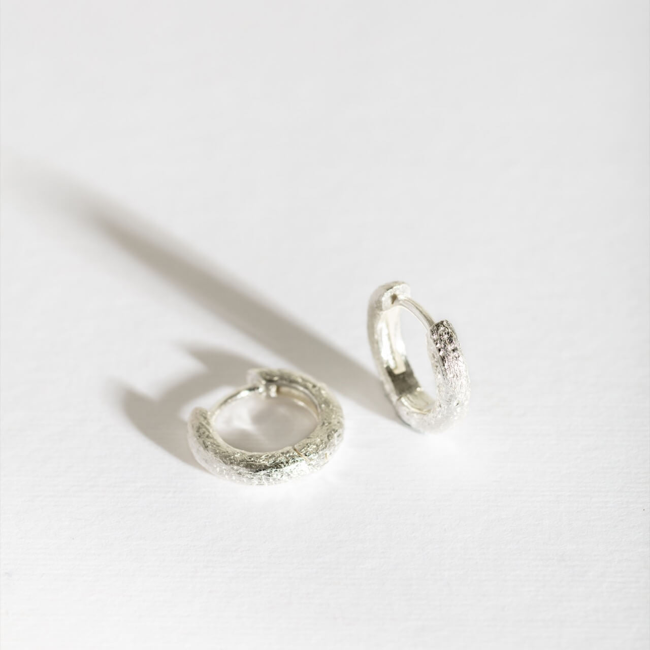 Antique-Textured Silver Huggie Earrings
