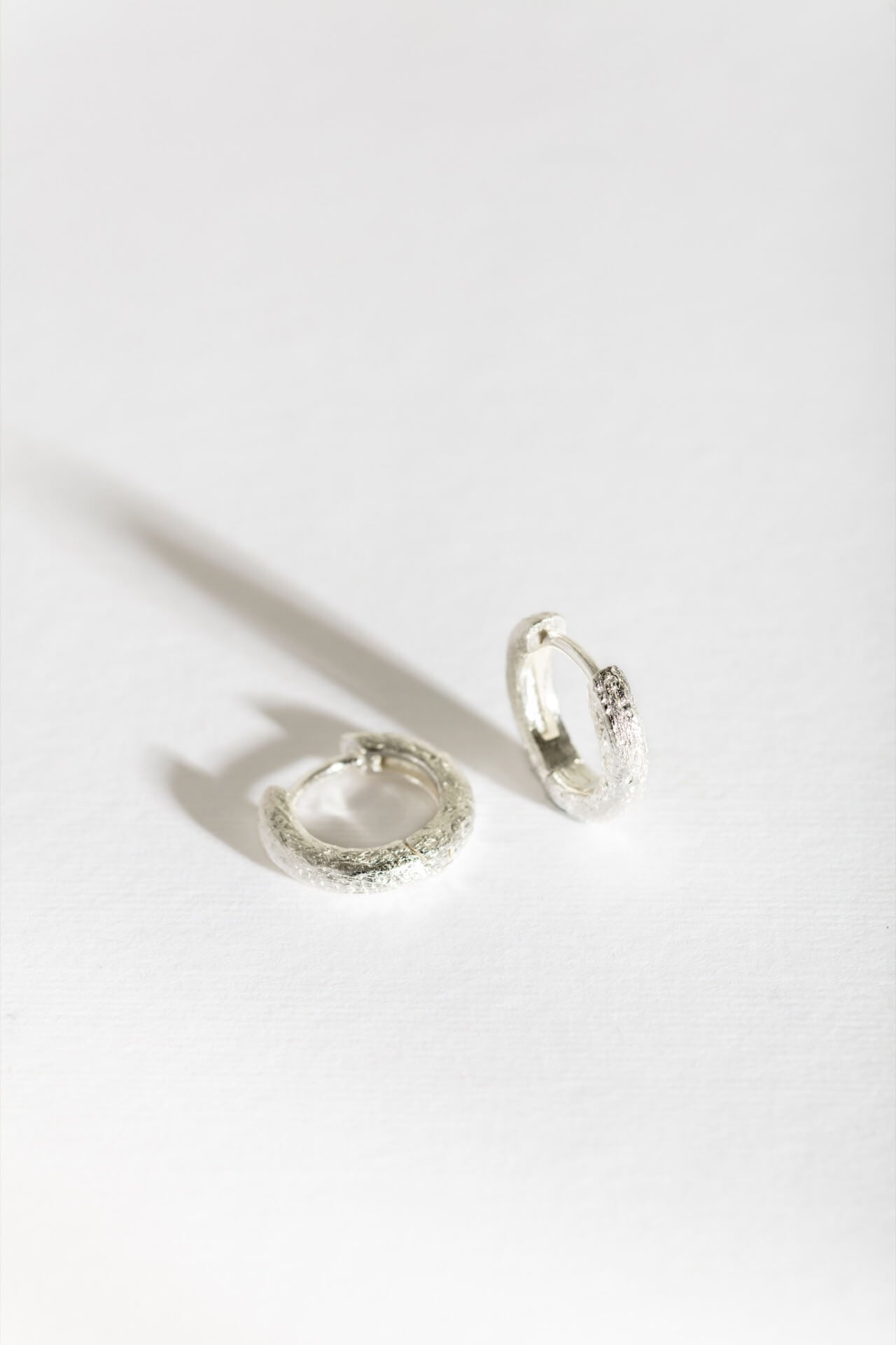 Antique-Textured Silver Huggie Earrings