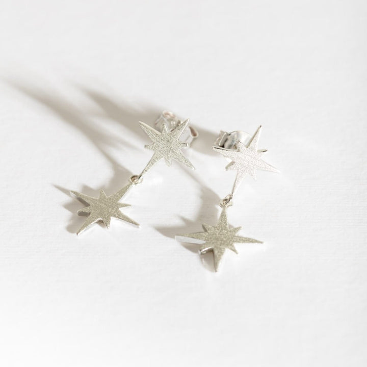 silver brushed double north star stud earrings