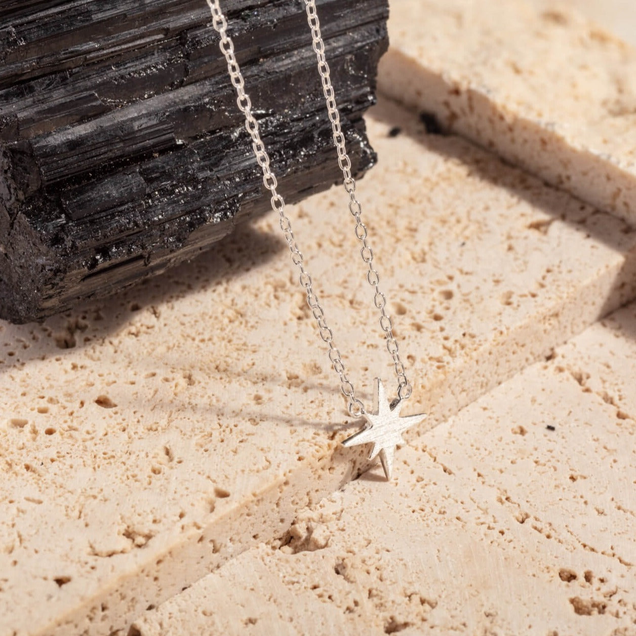 silver brushed north star dainty necklace