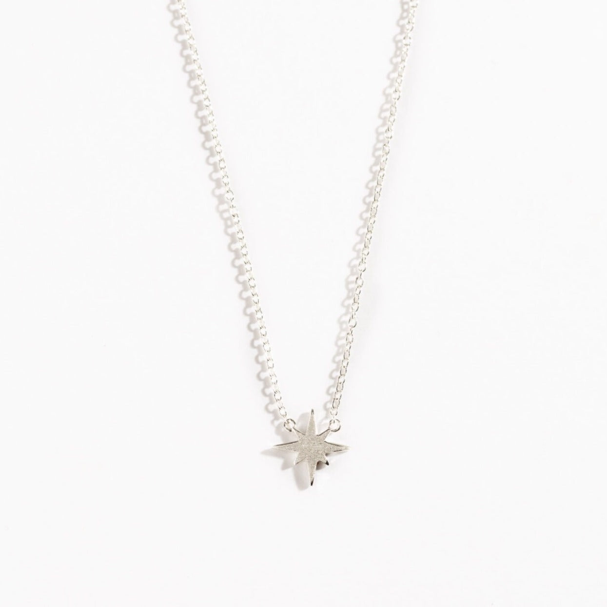 silver brushed north star dainty necklace