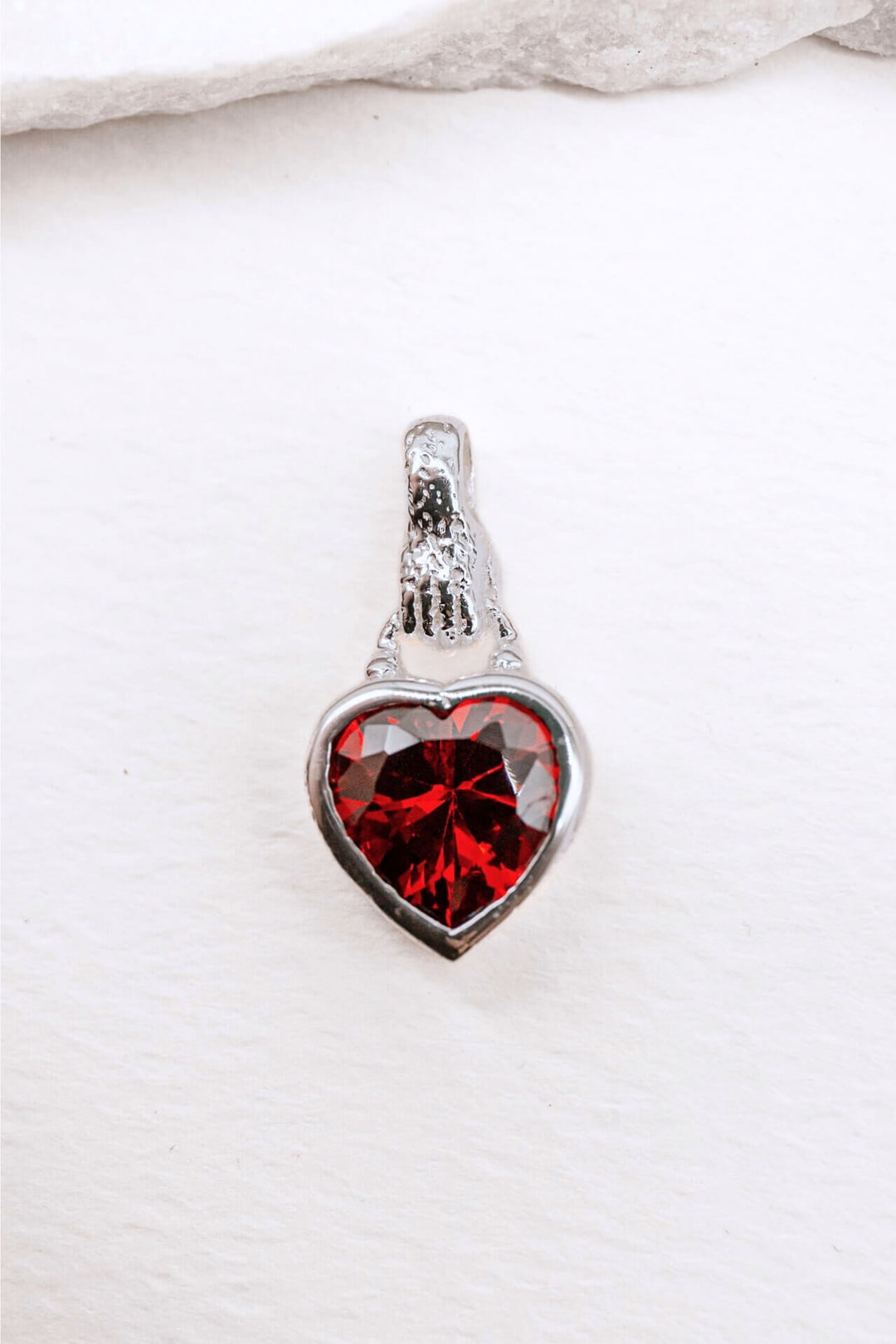 Garnet Heart in Hand Silver Charm Pendant