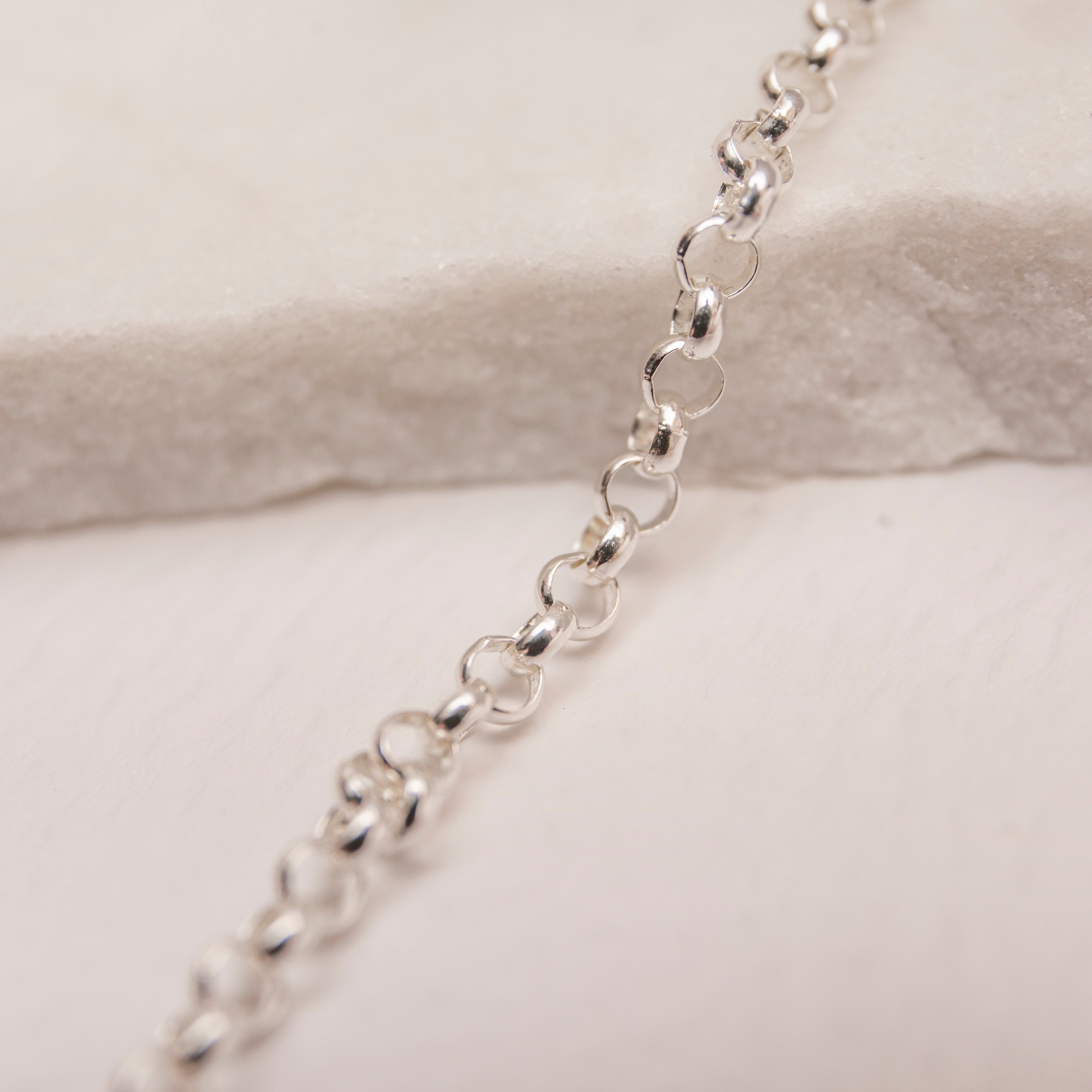 silver rolo belcher chain necklace close up 