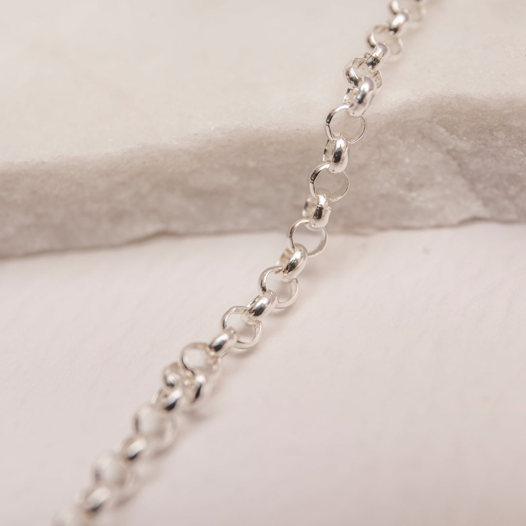 silver rolo belcher chain necklace close up 