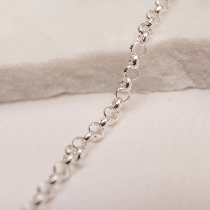 silver rolo belcher chain necklace close up 
