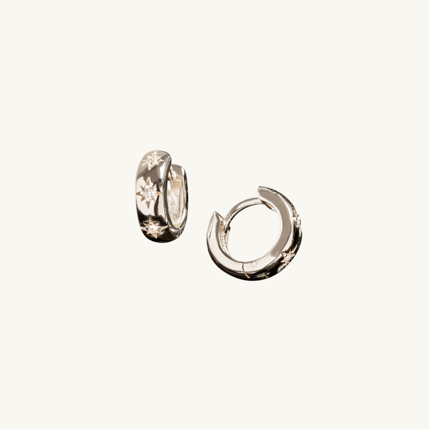 
Silver Sparkly Star Huggie Earrings
