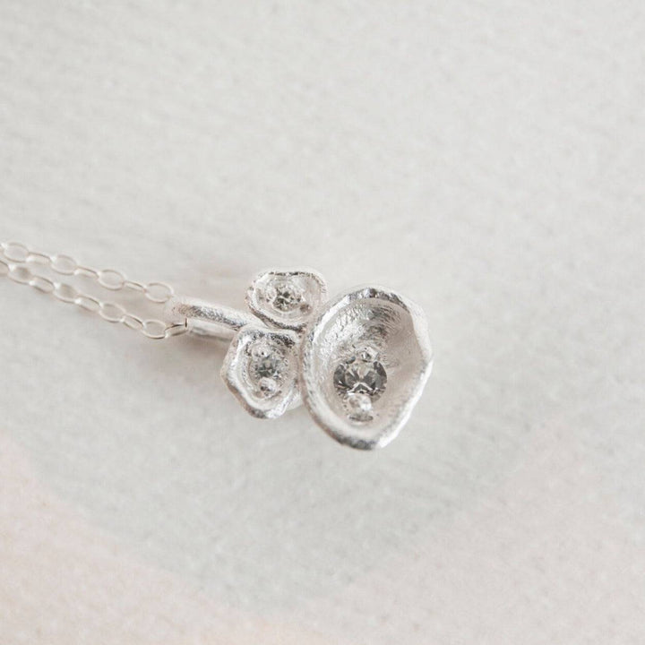White Topaz and Silver Lichen Birthstone Pendant Necklace close up